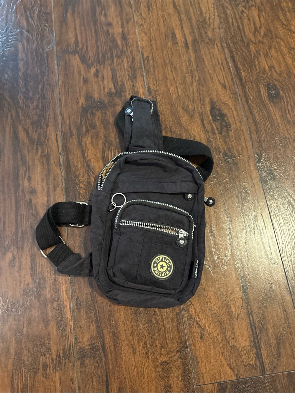 Kipling Black Sling Bag with Logo Patch